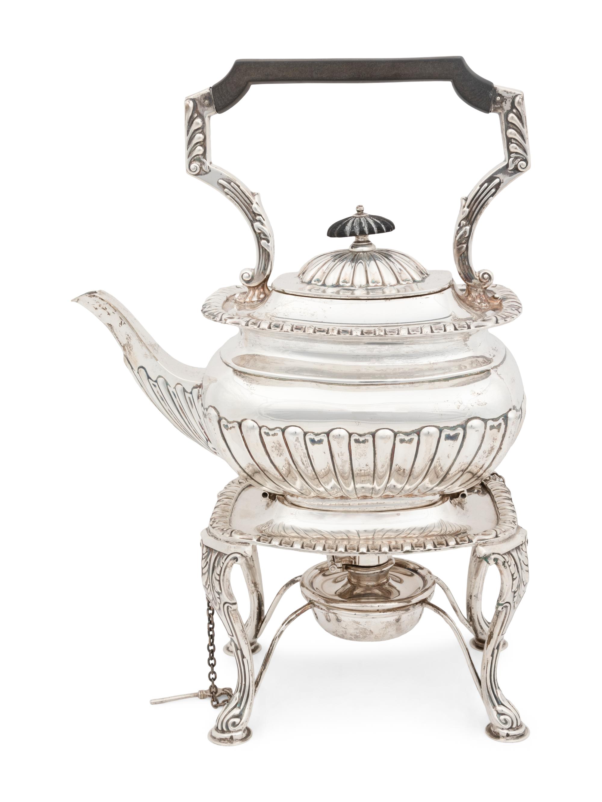 An Edwardian Silver Teapot on Stand