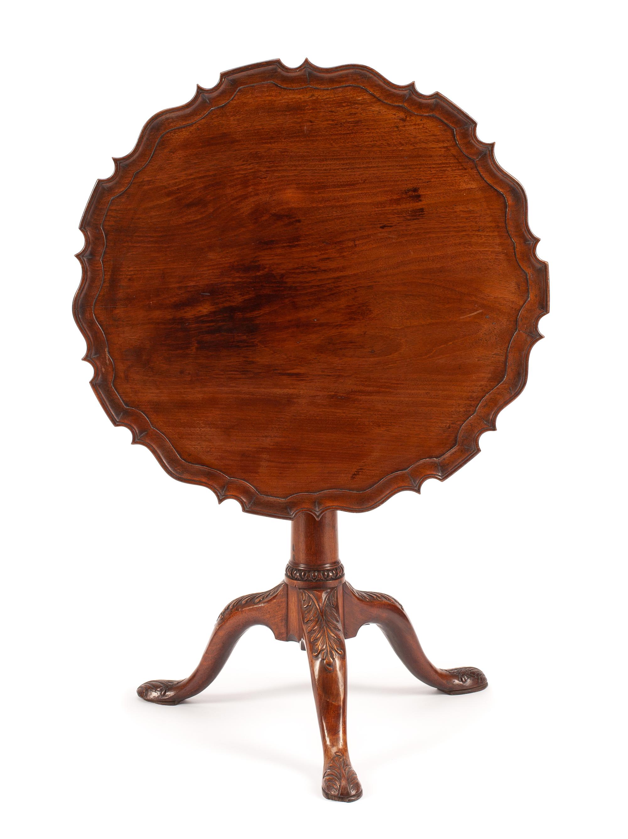 A George II Mahogany Tilt-Top Table Height 28 x diameter of top 29 1/2 inches. — 18TH CENTURY