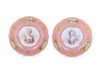 A Pair of Sèvres Painted and Parcel Gilt Pink-Ground Porcelain Plates