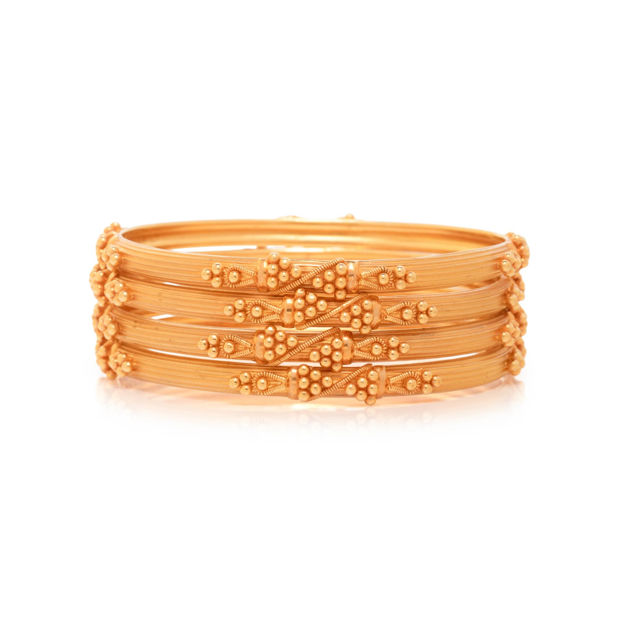 HIGH KARAT GOLD BANGLE BRACELET SET
