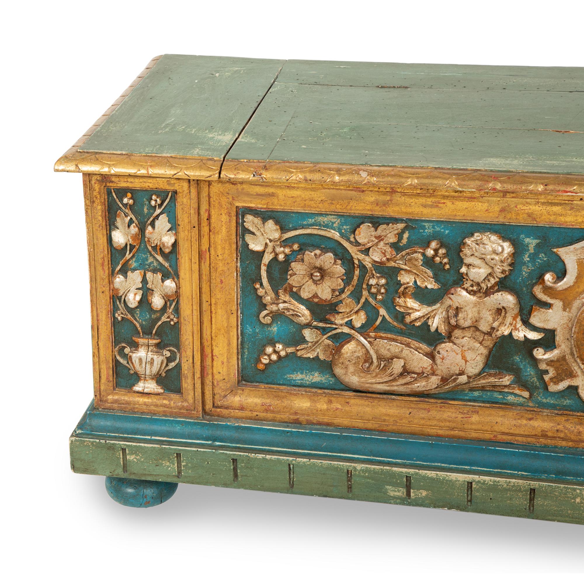 An Italian Parcel Gilt, Silvered and Polychrome Painted Cassone