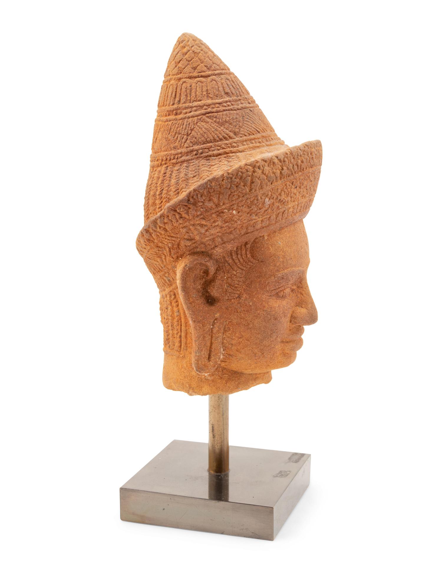A Cambodian Sandstone Head of a Deity