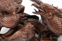 A Japanese Export Carved Rosewood Bird Group