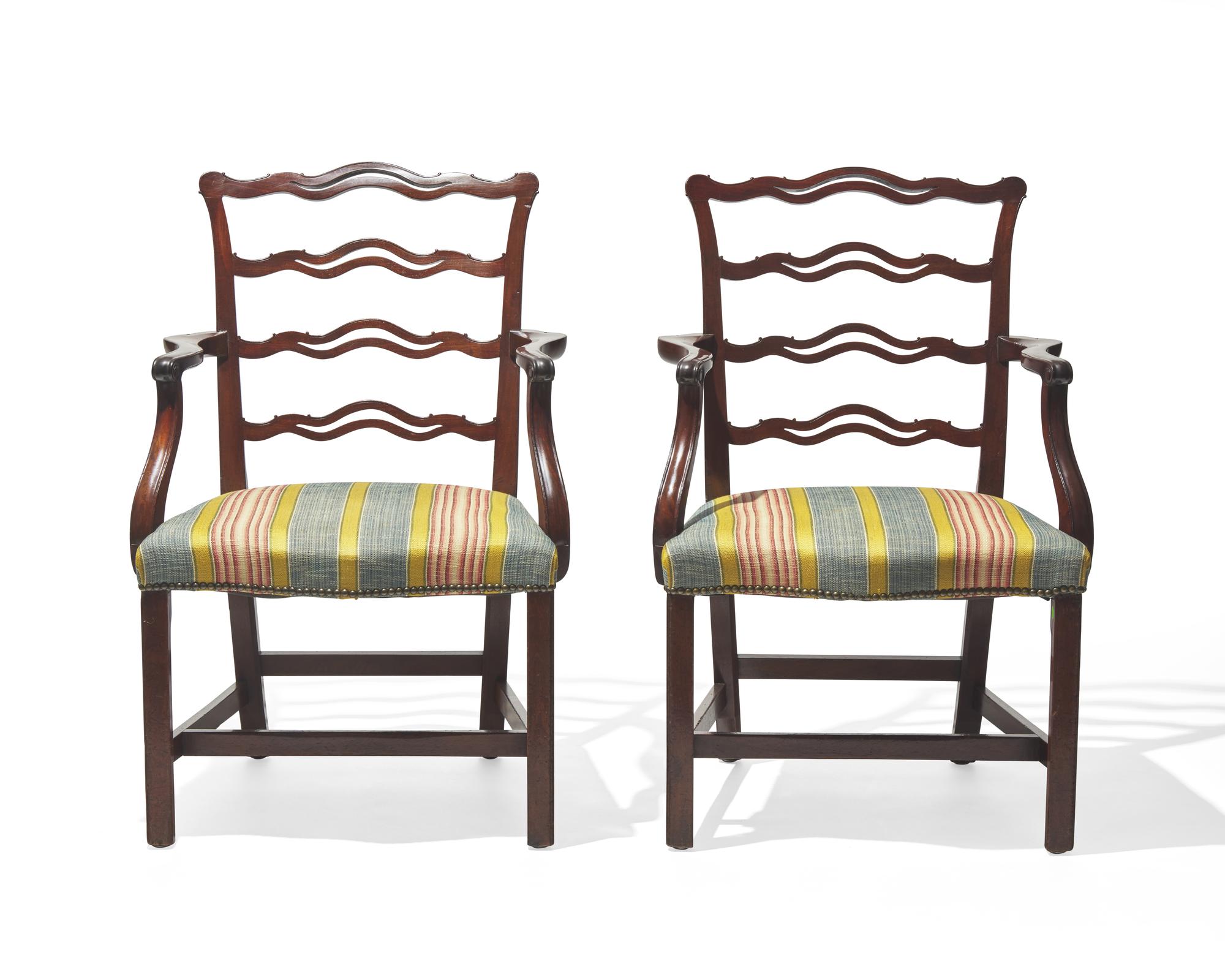 A pair of George III ribbon-back mahogany armchairs, late 18th / 19th century