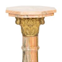 An Empire Style Gilt Bronze Mounted Variegated Pink Marble Pedestal