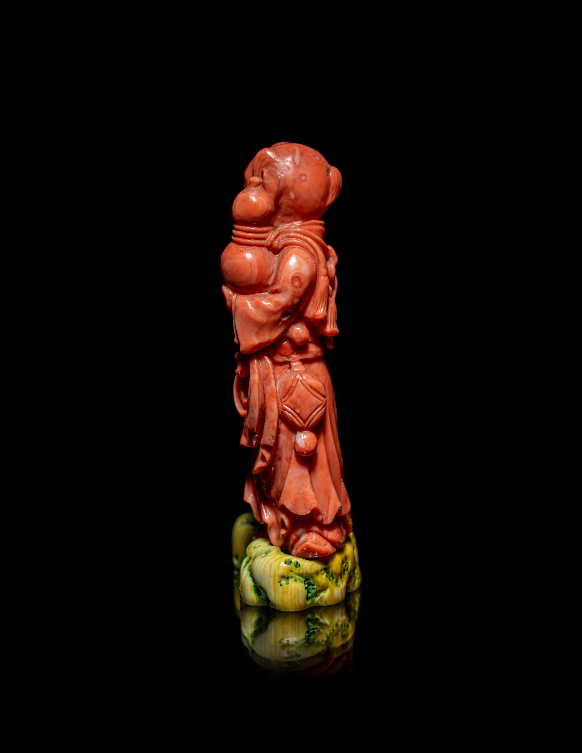 A Chinese Coral Figural Group of a Boy and a Dog