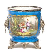 A Silvered Bronze Mounted Sevres Style Porcelain Jardiniere Height 12 x diameter 10 1/2 inches.