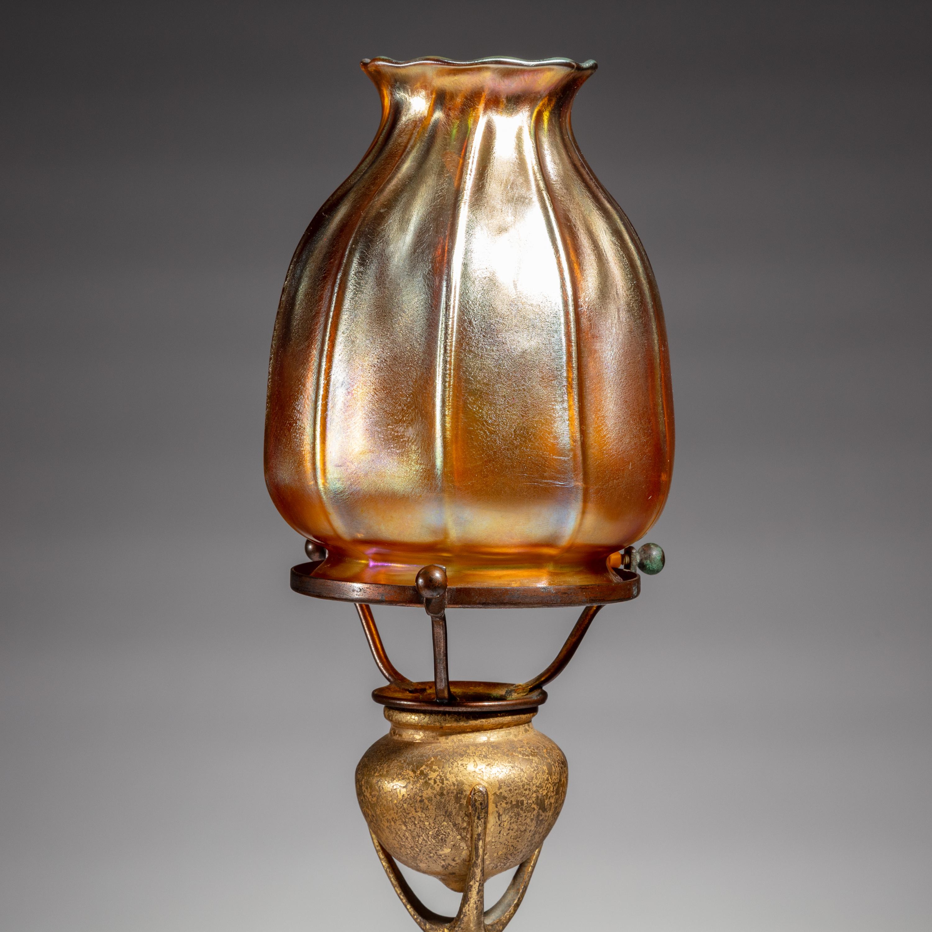 Tiffany Studios New York (American, 1880–1930) — Pair of Favrile Candlesticks, c. 1900