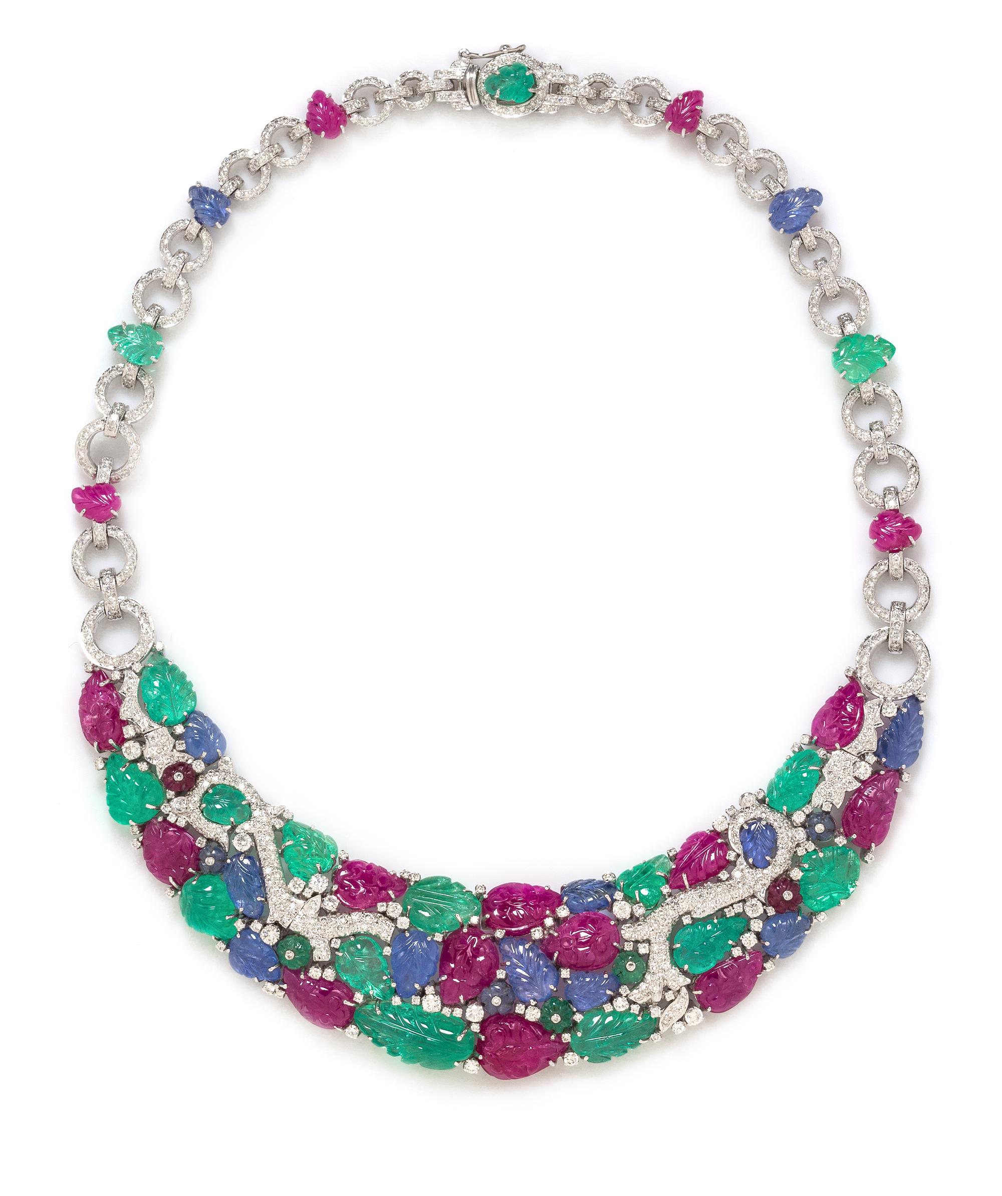 An 18 Karat White Gold, Diamond, Carved Ruby, Sapphire, and Emerald Necklace, 58.70 dwts.