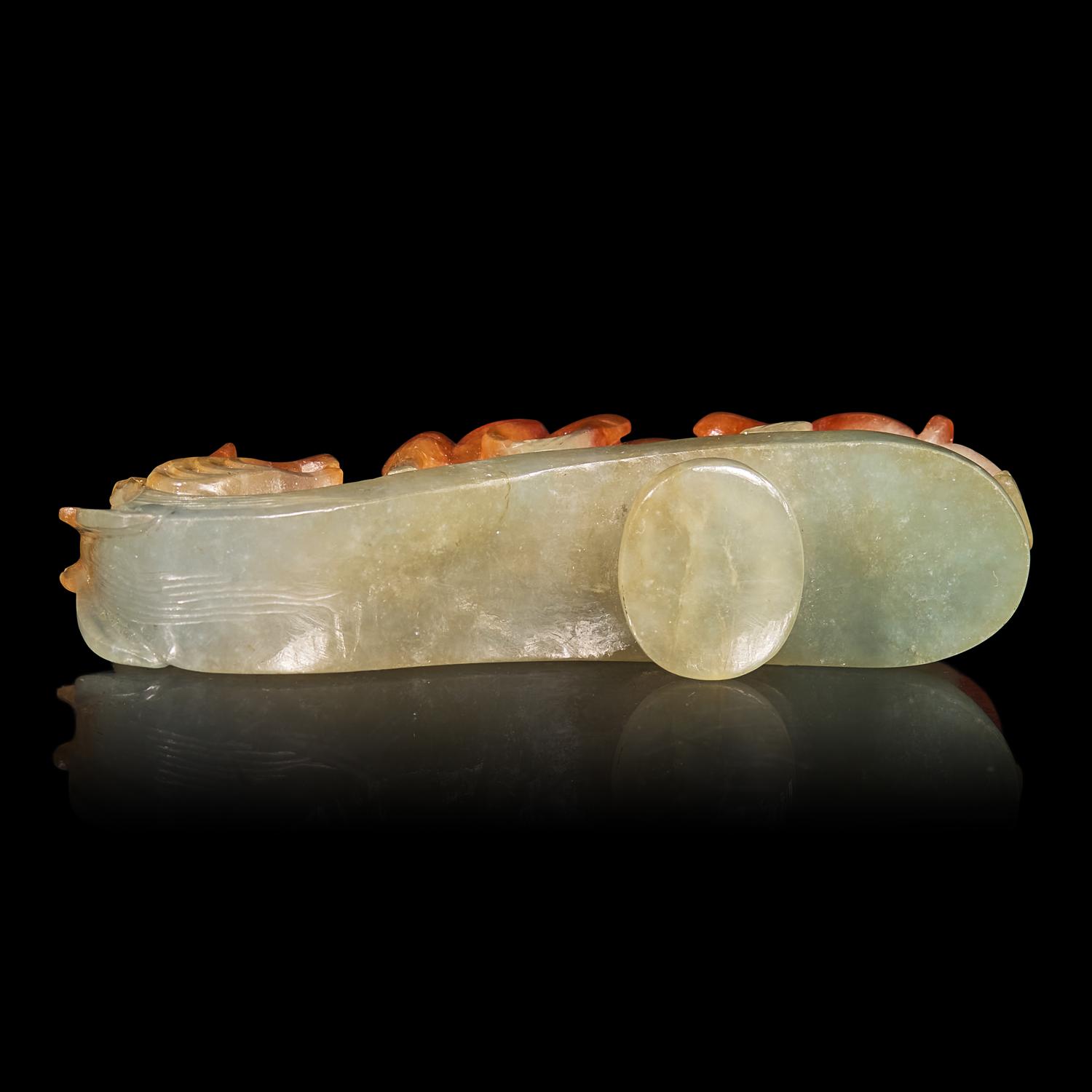 A Chinese Russet and Pale Celadon Jadeite "Dragons" Belthook 翡翠龍紋帶鉤