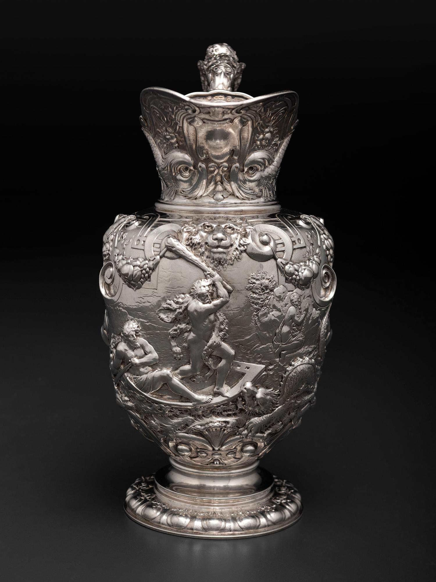 An American Baroque Style Repousse Silver Pitcher