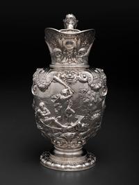 An American Baroque Style Repousse Silver Pitcher