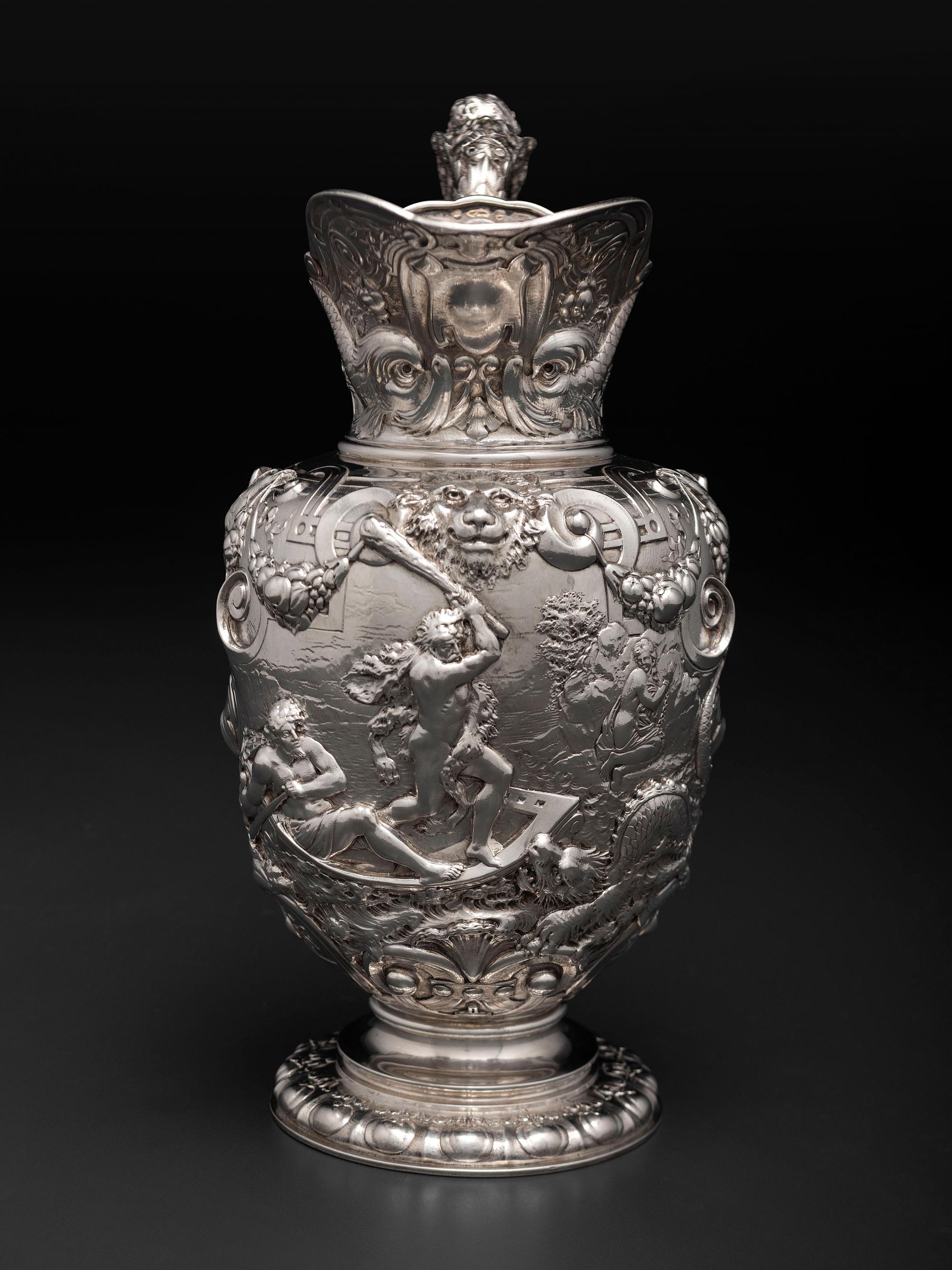 An American Baroque Style Repousse Silver Pitcher