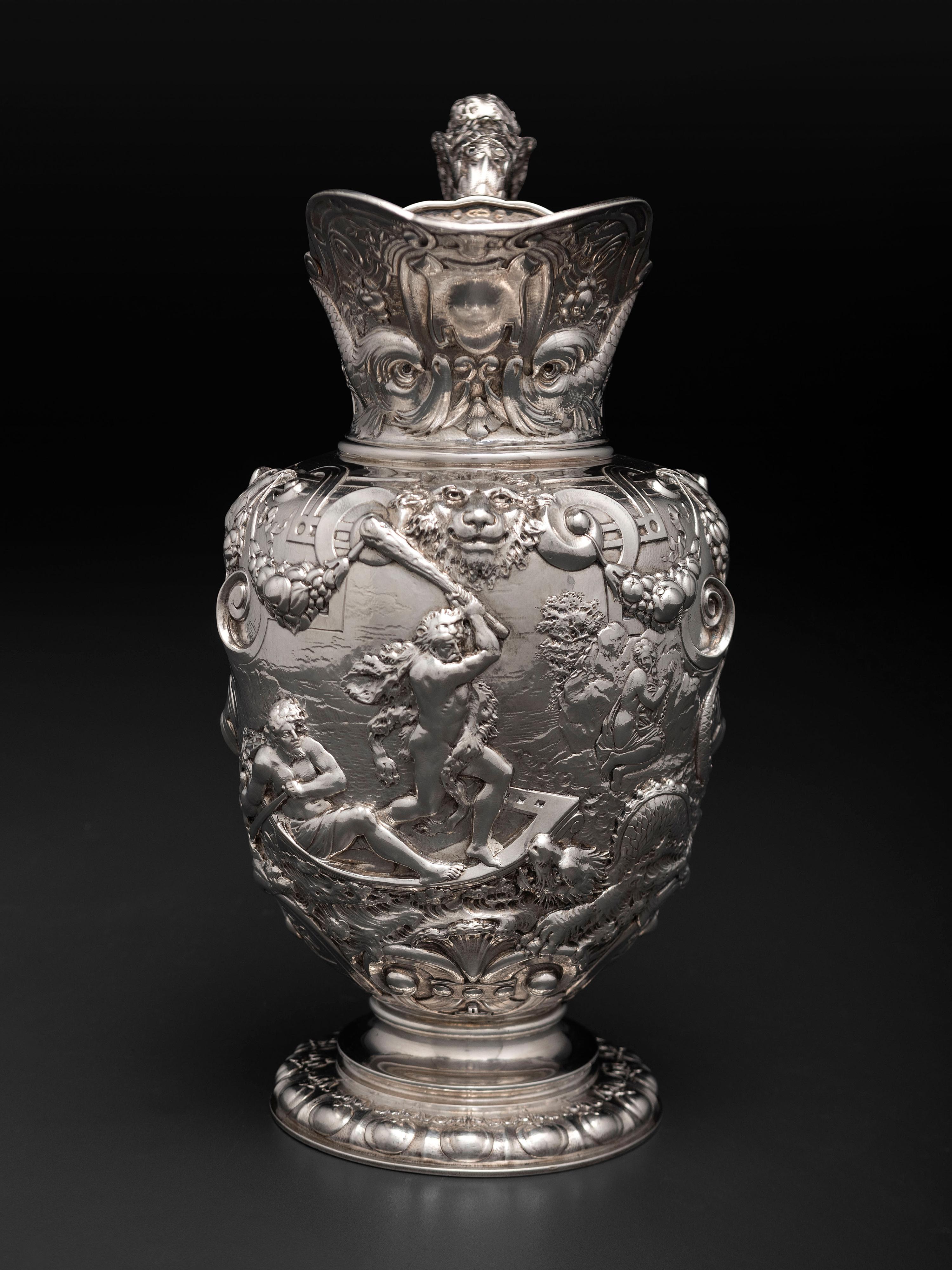 An American Baroque Style Repousse Silver Pitcher