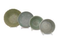 A Collection of Four Chinese and Korean Celadon Porcelain Bowls