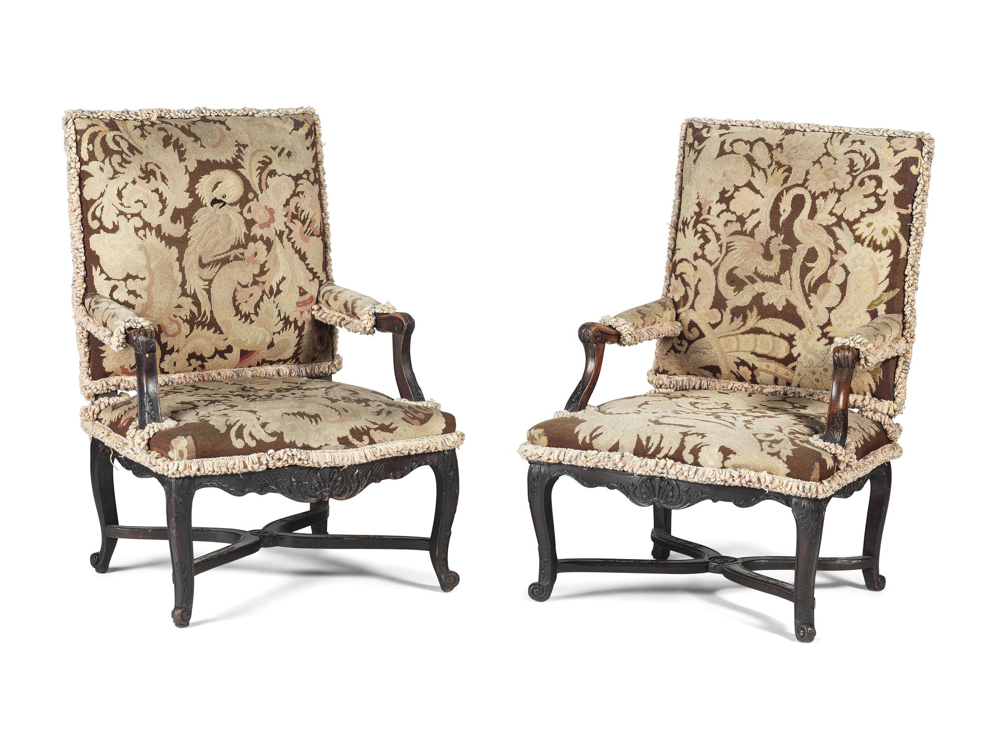 A Pair of Louis XV Style Carved Walnut Needlepoint Upholstered Fauteuils