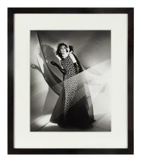 Four photographs depicting Dayle Haddon