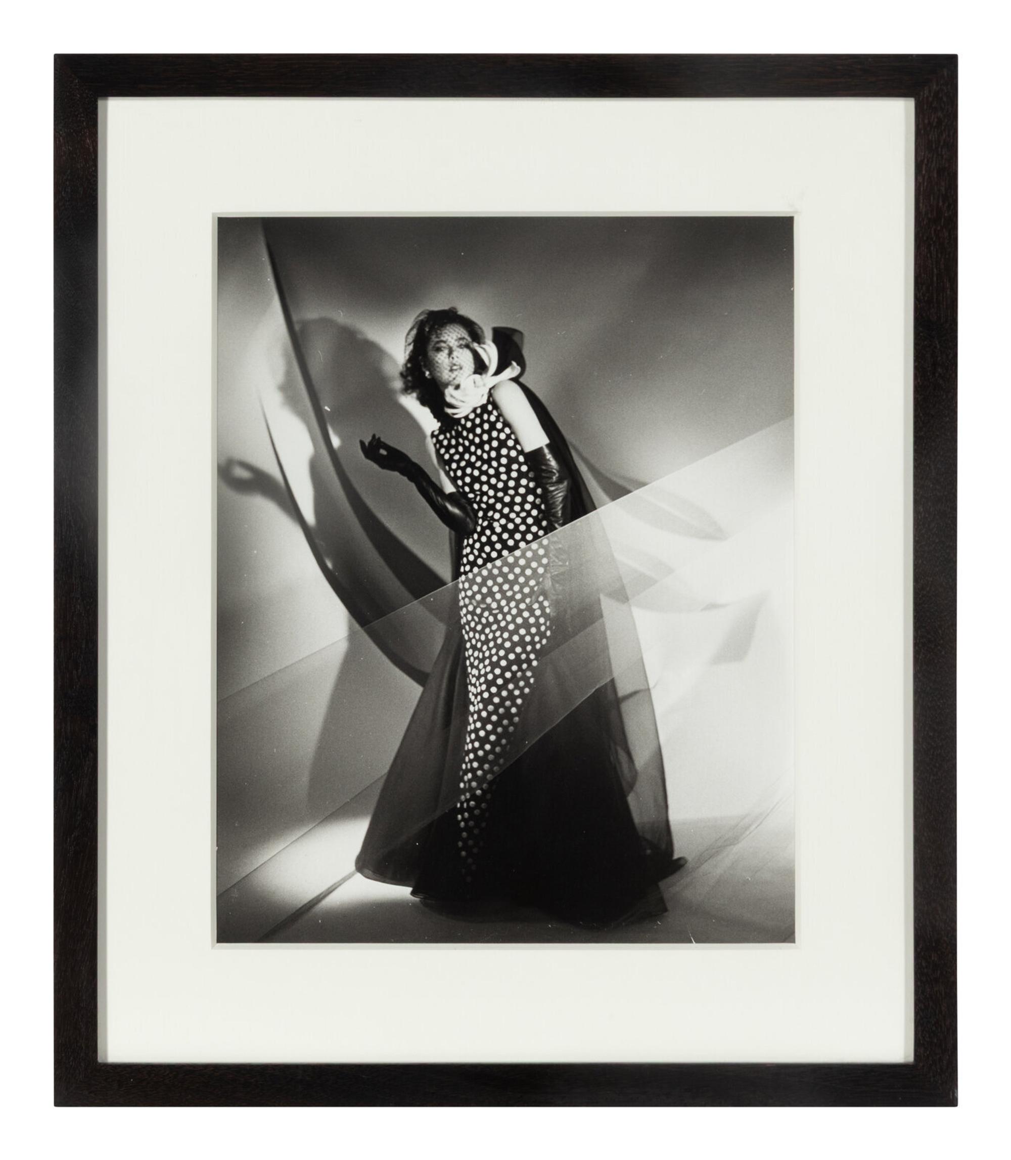 Four photographs depicting Dayle Haddon
