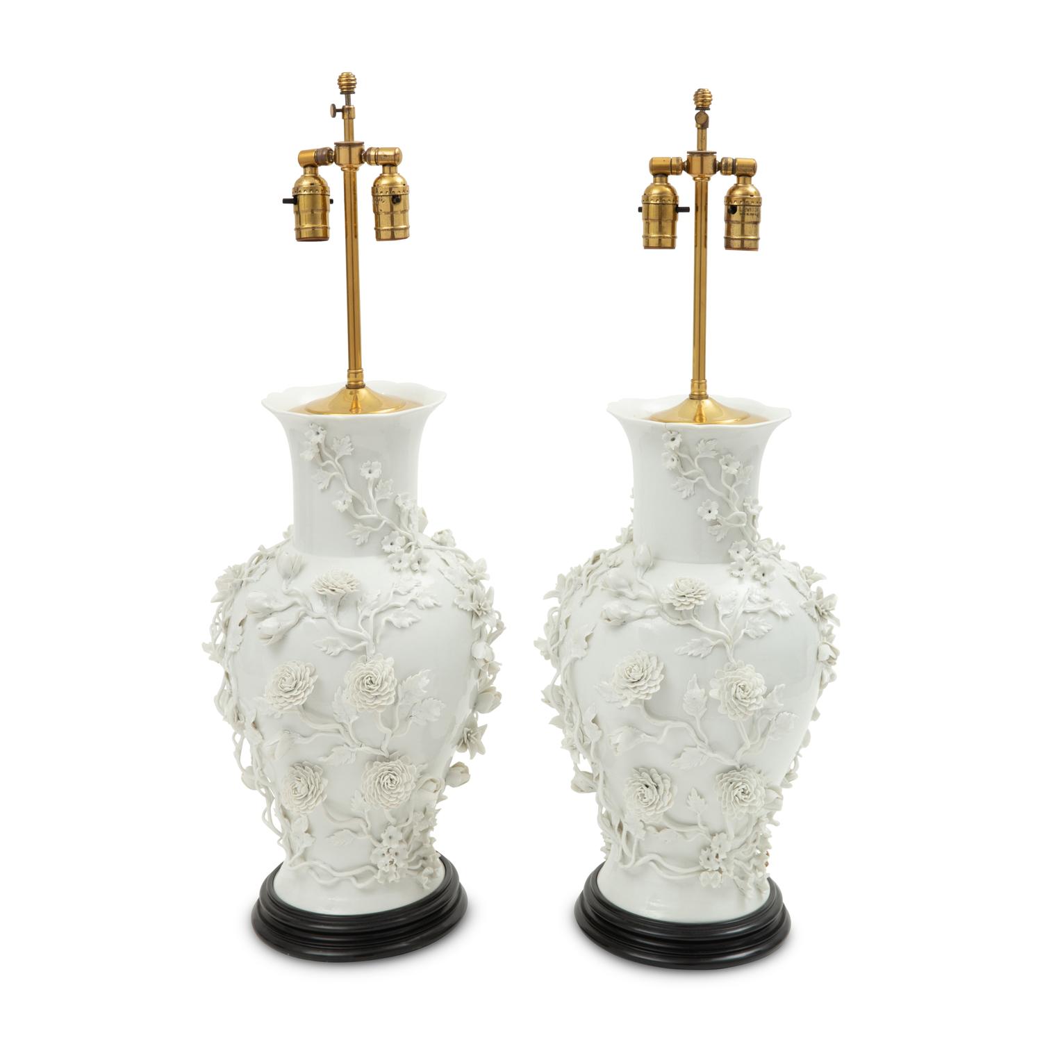 A Pair of Blanc de Chine Floral Porcelain Vases Mounted as Lamps