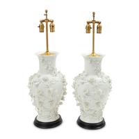 A Pair of Blanc de Chine Floral Porcelain Vases Mounted as Lamps