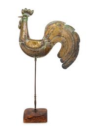 A Molded Copper Rooster Ornament