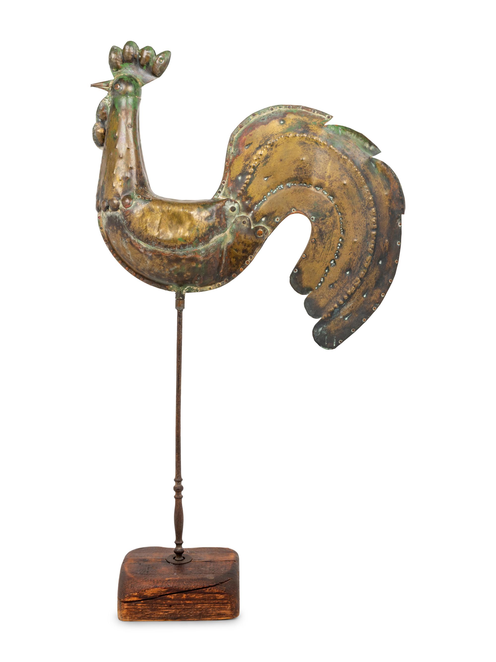 A Molded Copper Rooster Ornament