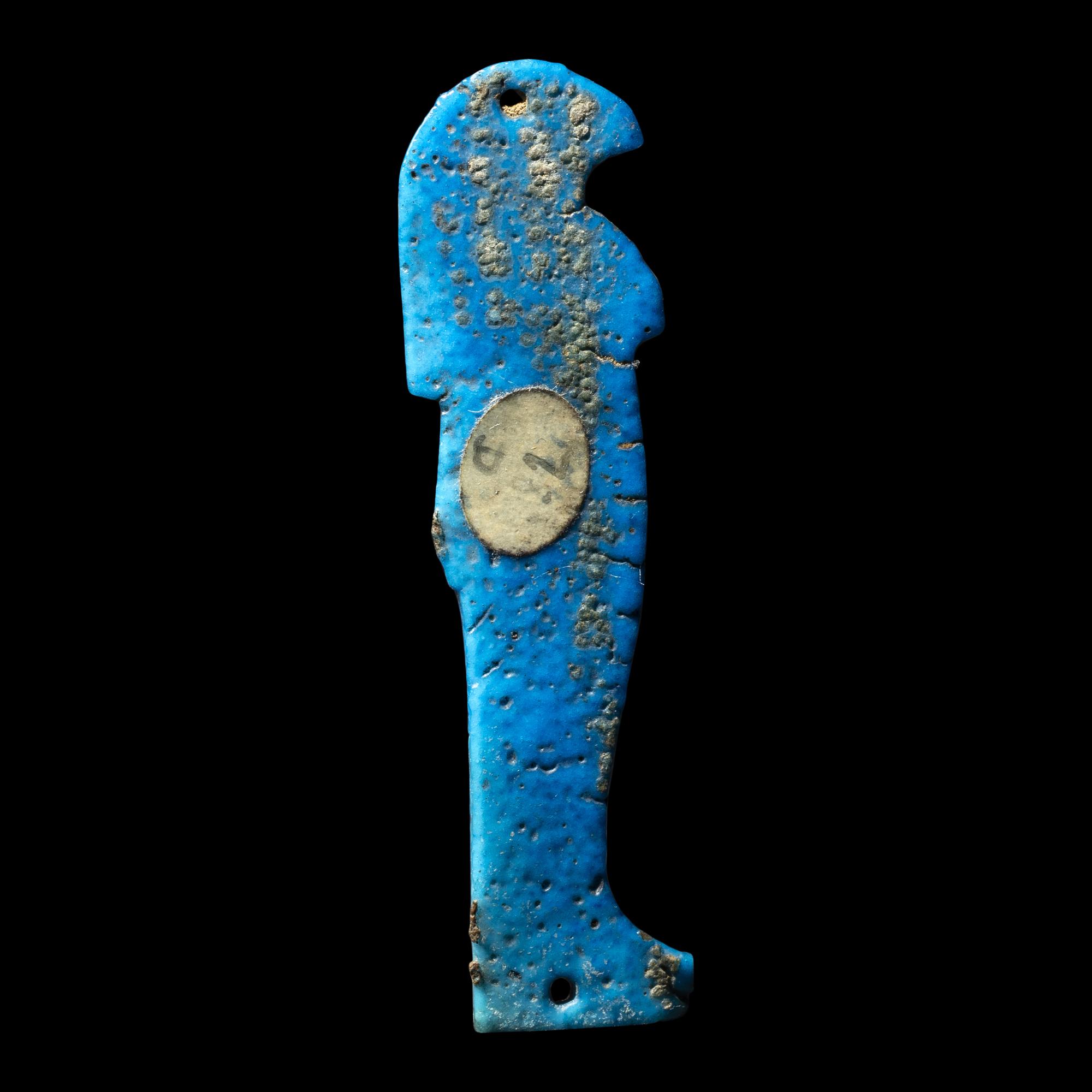 An Egyptian Faience Amulet of a Son of Horus