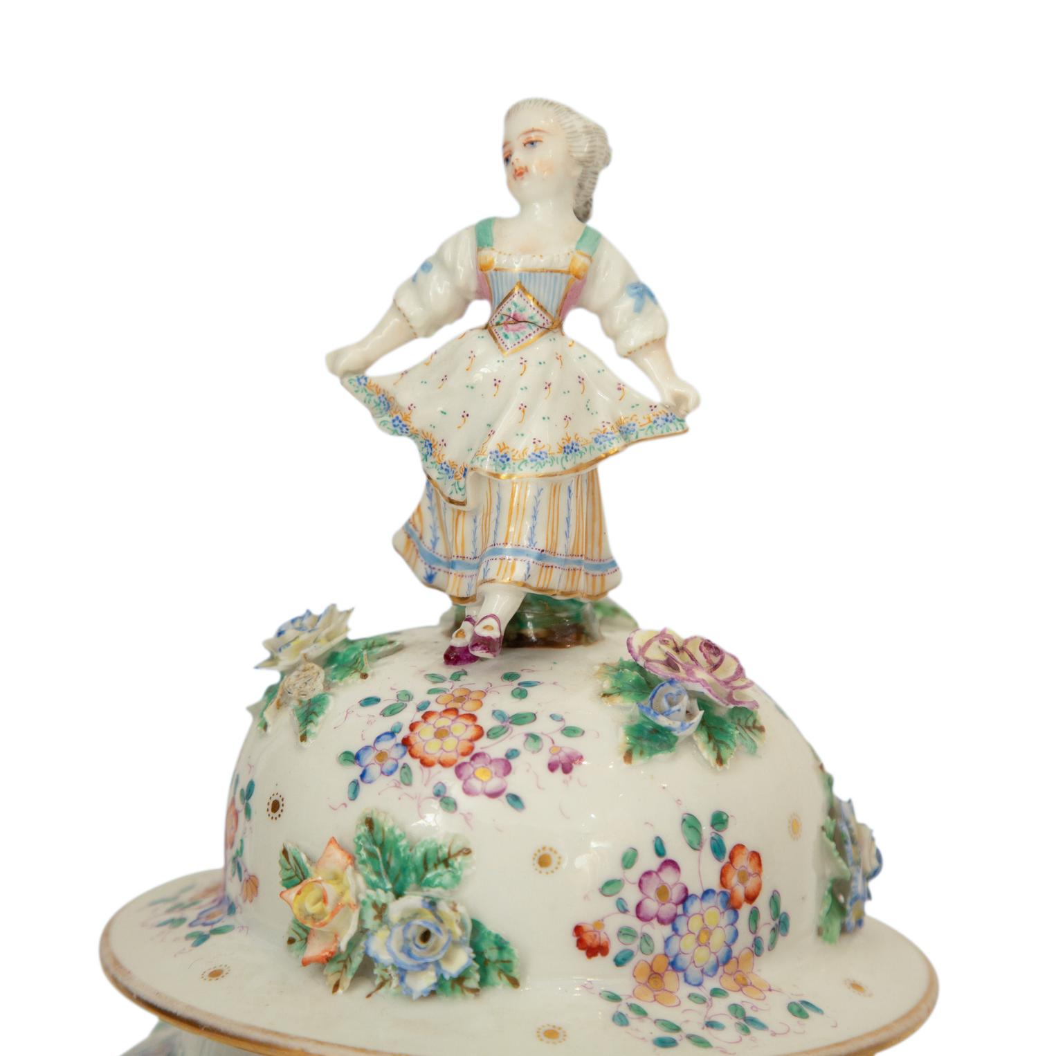 A Pair of Meissen Porcelain Covered Jars with Figural Finials