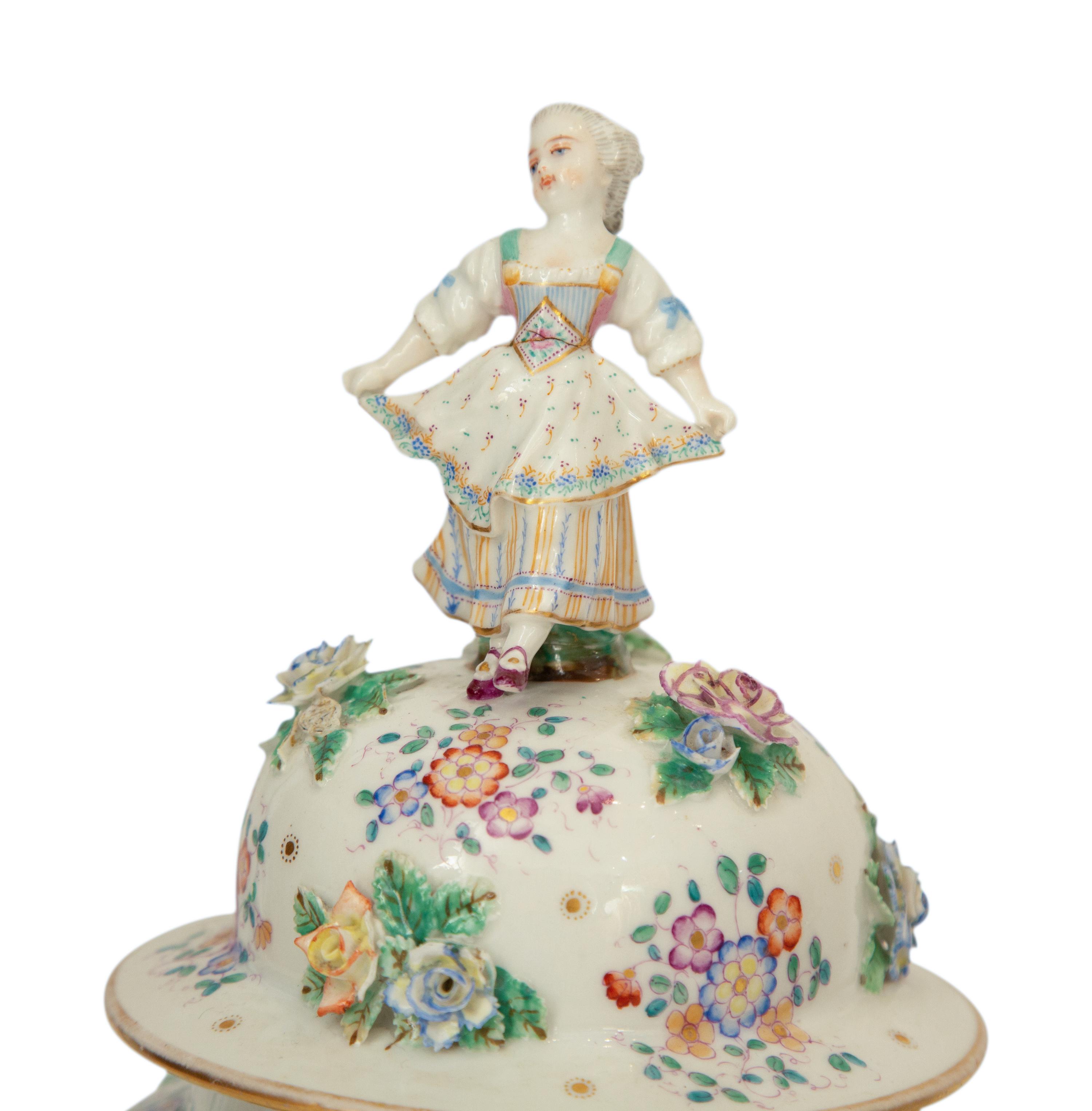 A Pair of Meissen Porcelain Covered Jars with Figural Finials