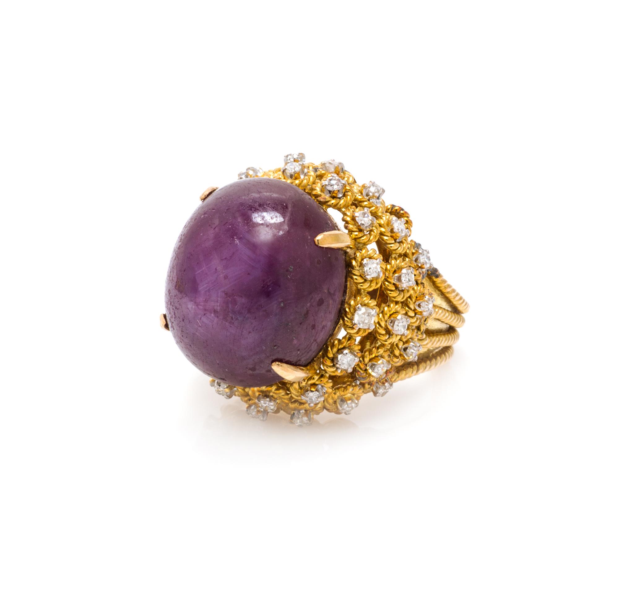 A 14 Karat Yellow Gold, Ruby and Diamond Ring, 14.00 dwts.