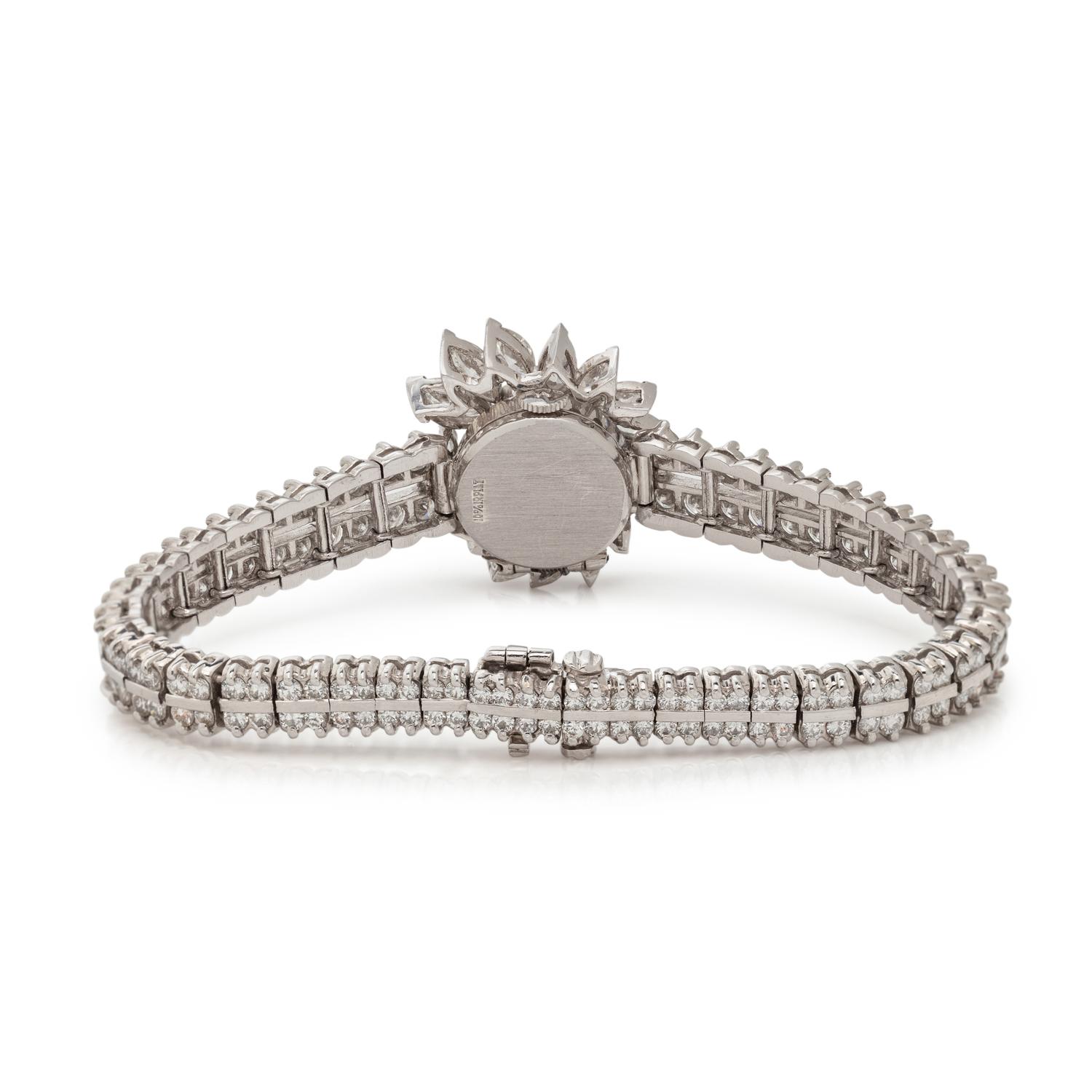 MOVADO, DIAMOND SURPRISE WATCH