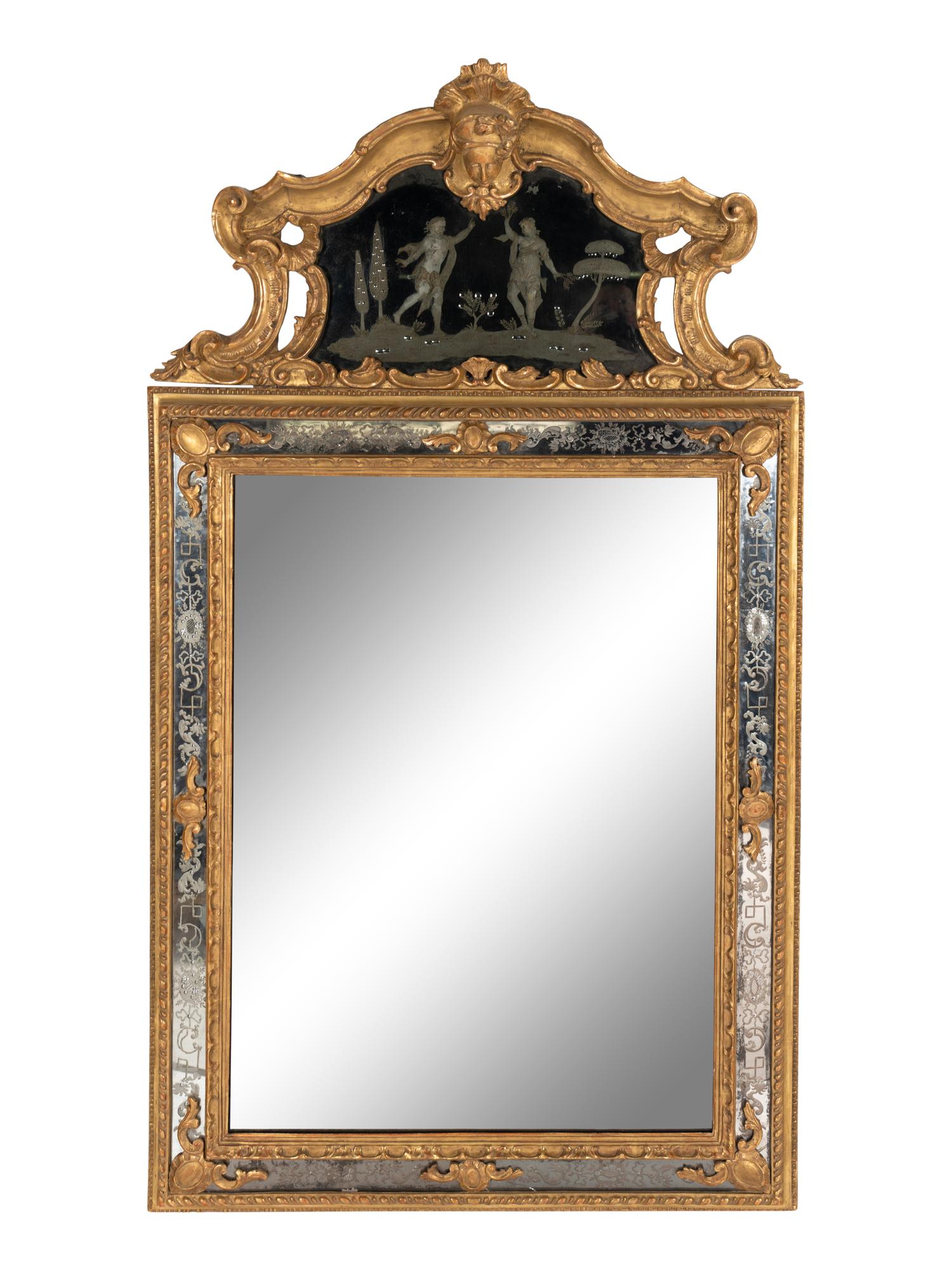 An Italian Rococo Giltwood and Etched Glass Mirror