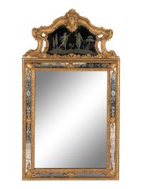 An Italian Rococo Giltwood and Etched Glass Mirror