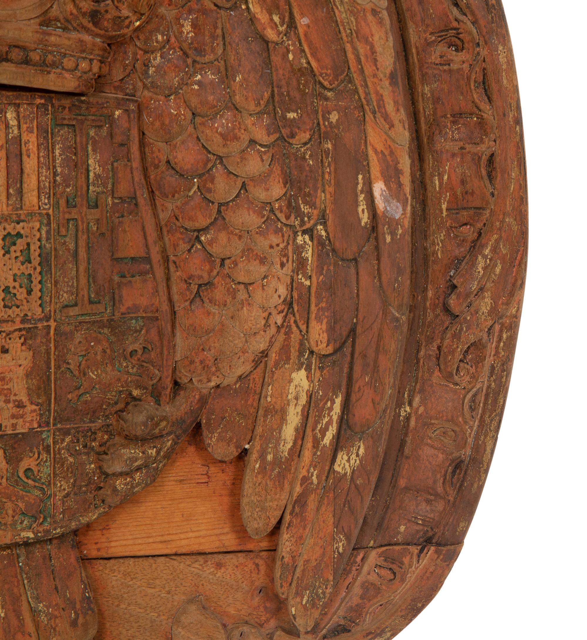 A Continental Carved, Parcel Gilt and Polychrome Painted Heraldic Crest