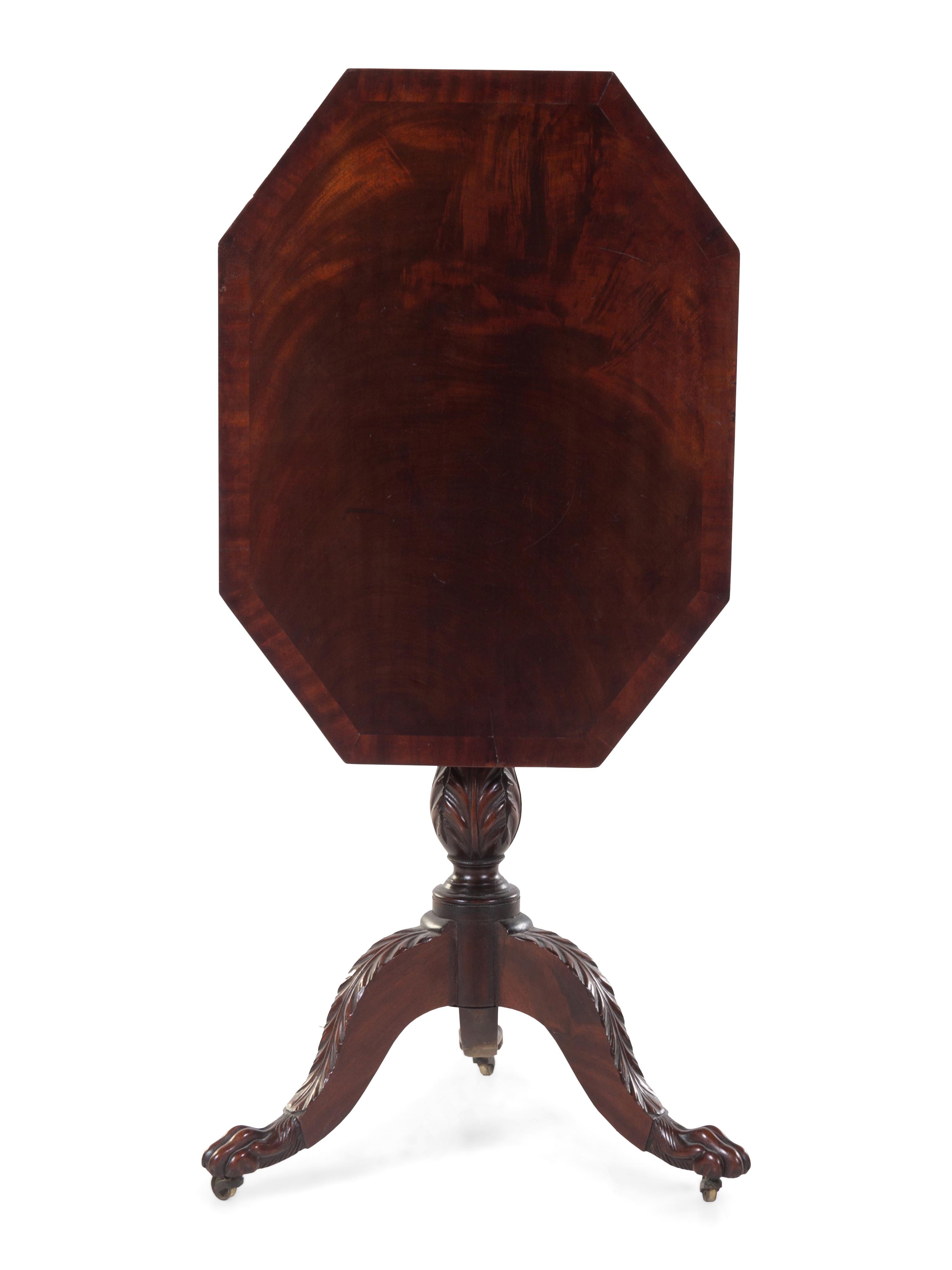 A Classical Carved and Figured Mahogany Octagonal Tilt-Top Candlestand