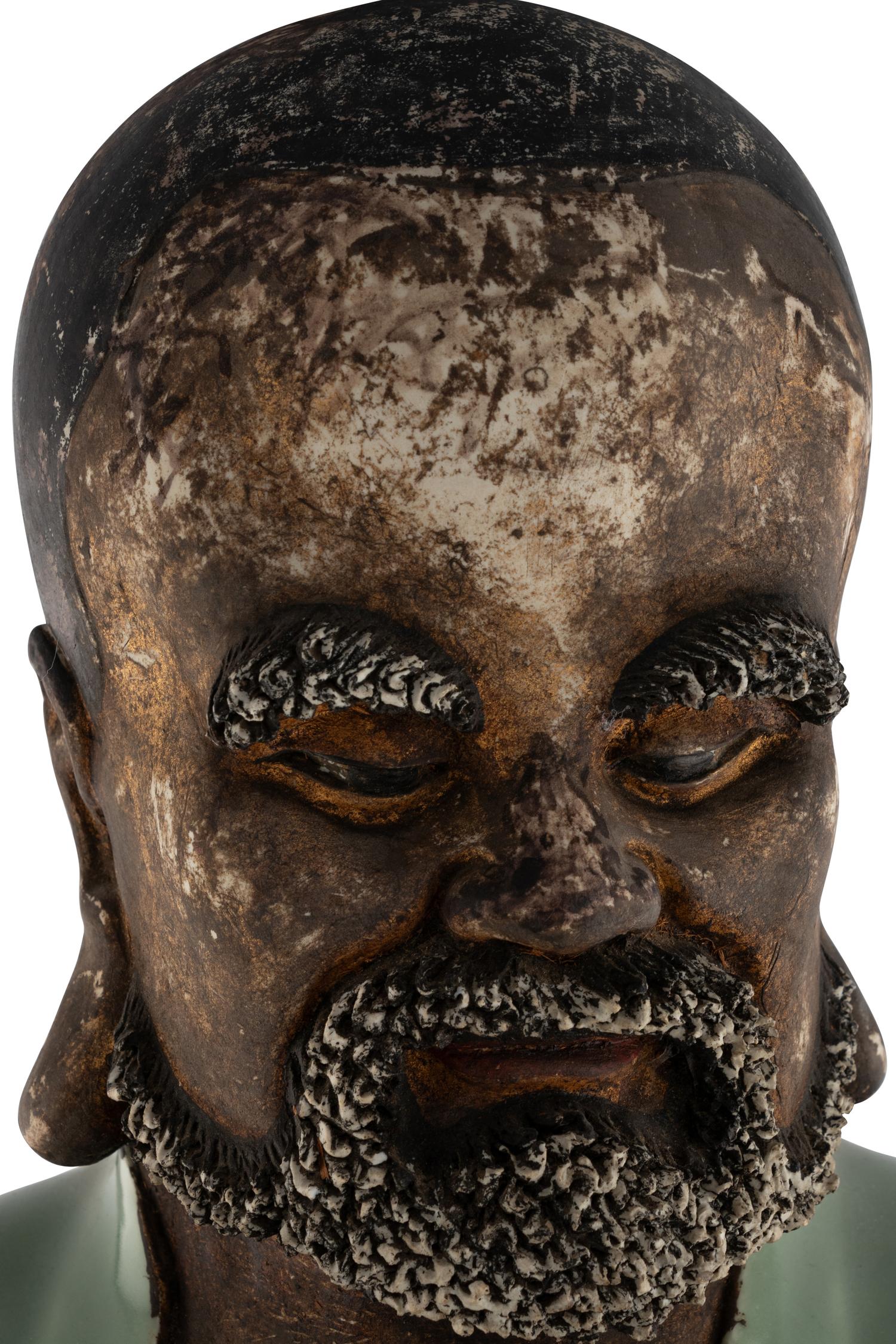 A Large Chinese Celadon Glazed Porcelain Figure of Damo