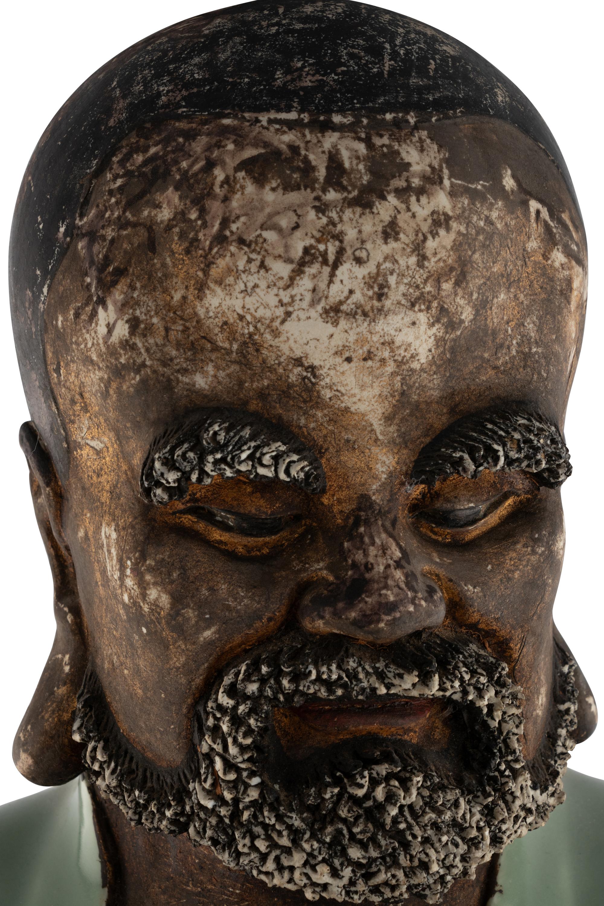 A Large Chinese Celadon Glazed Porcelain Figure of Damo