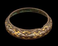 A Group of Four Chinese Gold and Silver Inlaid Bronze Fittings from Hu Vessels