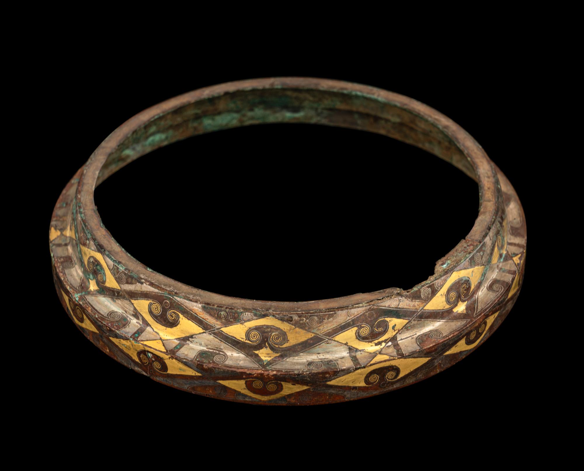 A Group of Four Chinese Gold and Silver Inlaid Bronze Fittings from Hu Vessels