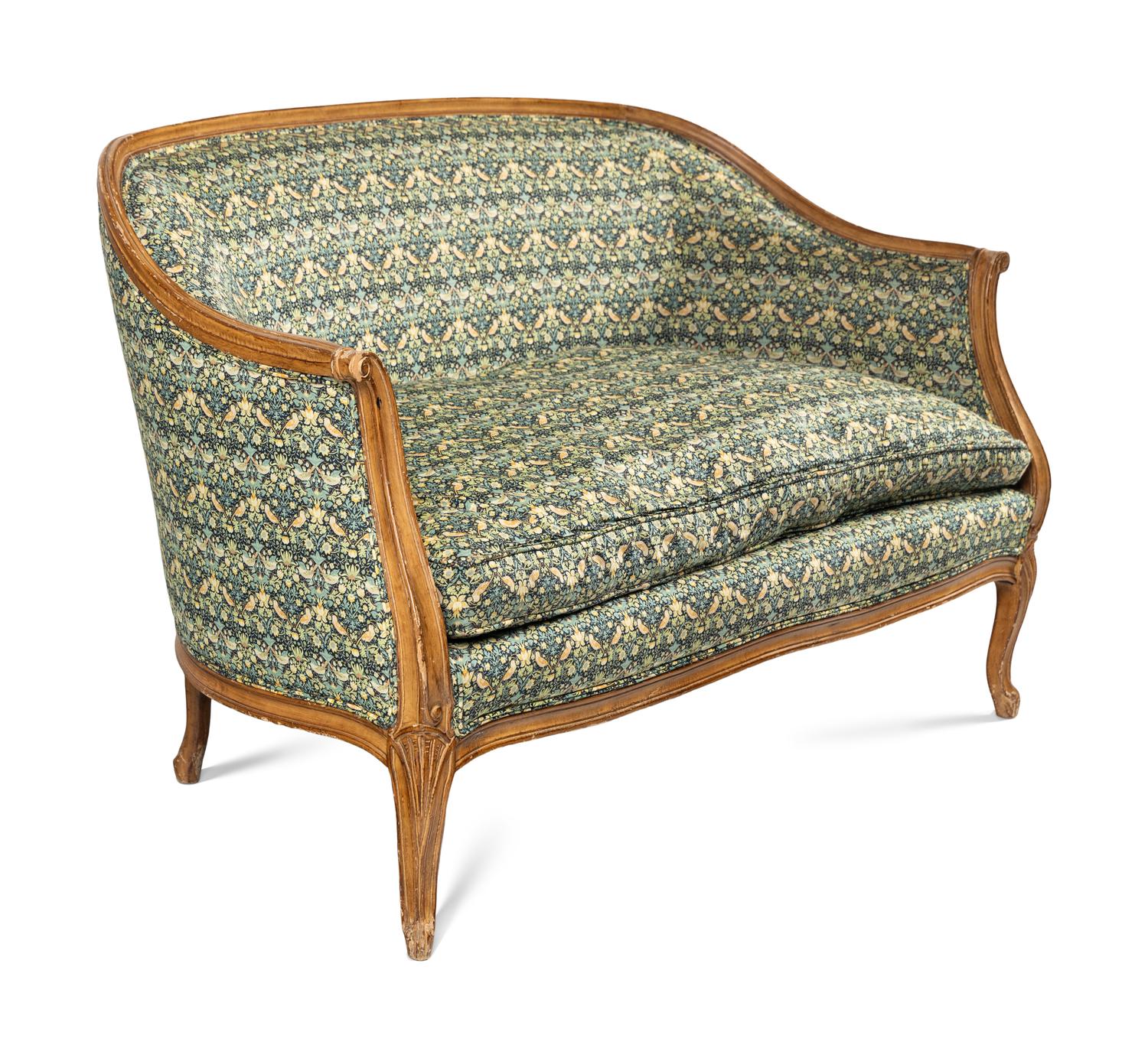 A Louis XV Style Settee with Strawberry Thief Upholstery