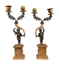 A Pair of Gilt and Patinated Bronze Figural Two-Light Candelabra