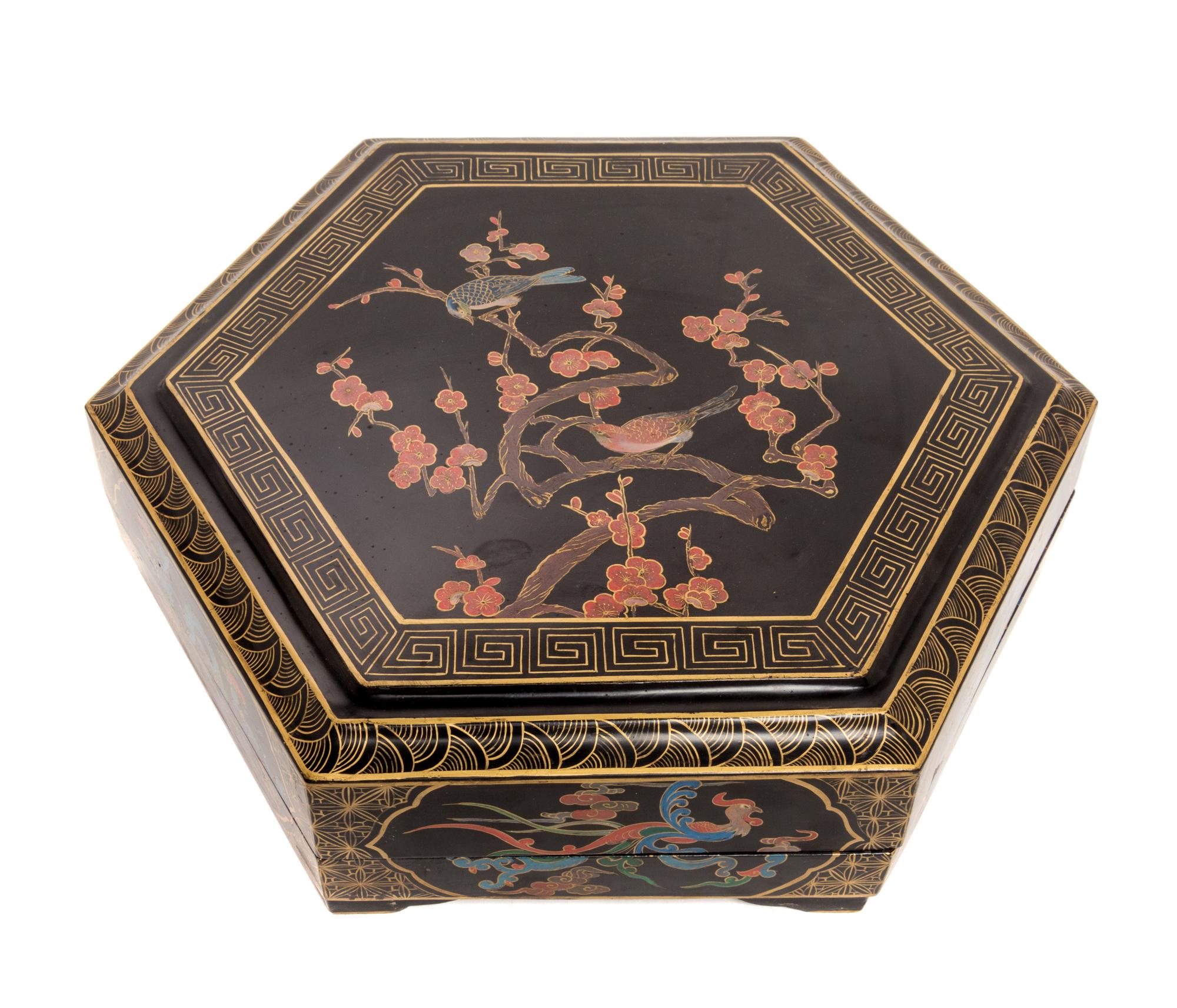 A Black Lacquer Covered Box Diameter 19 3/4 inches.