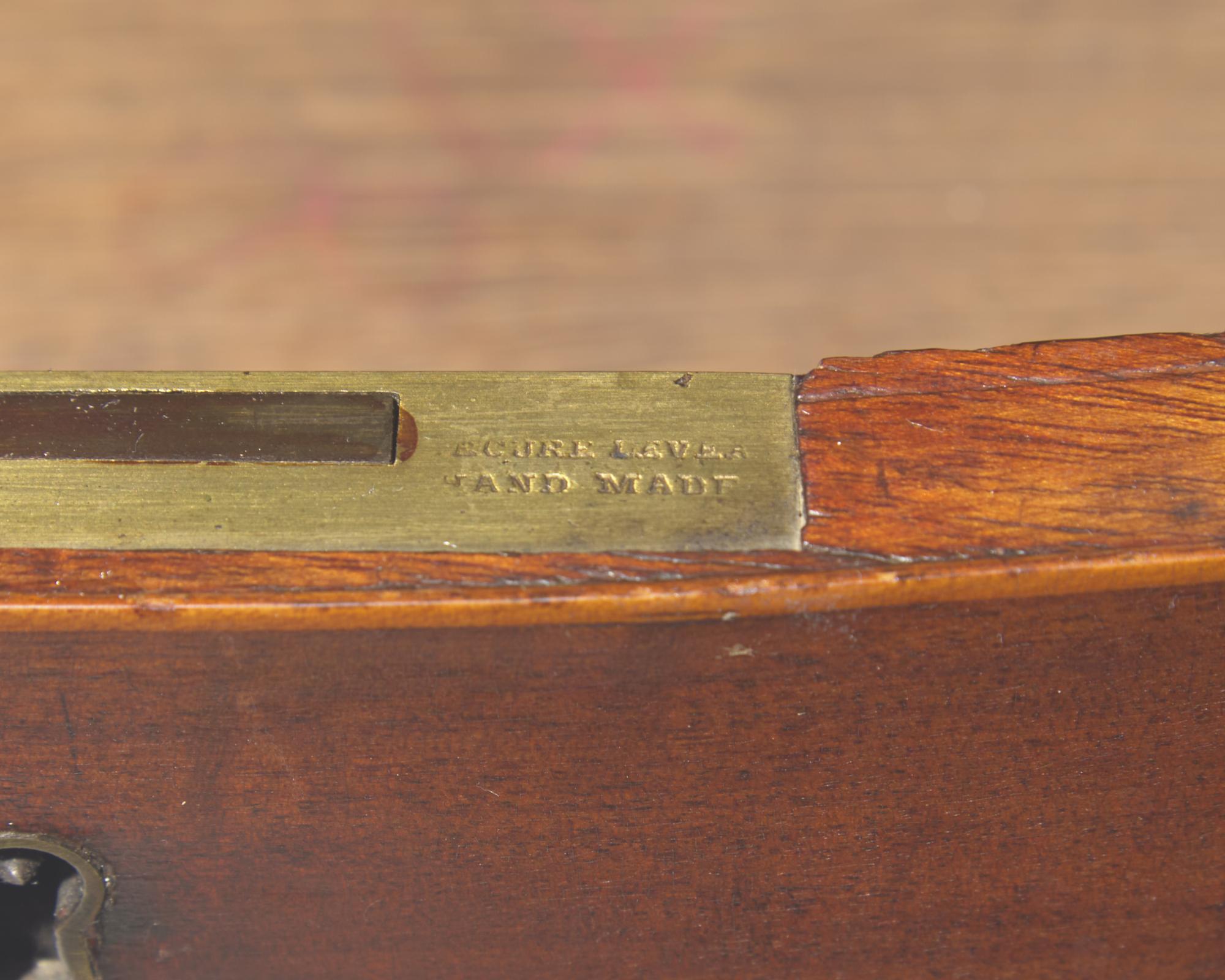 A Regency inlaid mahogany library center table, stamped "Willson London," circa 1820