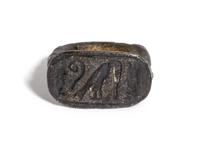 An Egyptian Bronze Stirrup Ring