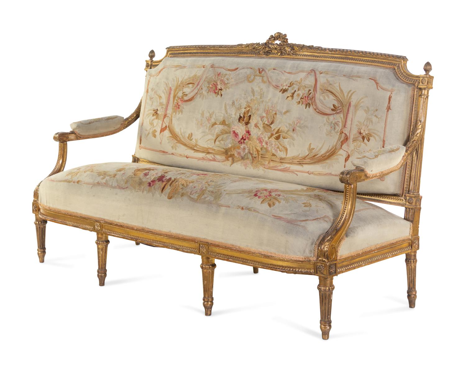 A Louis XVI Style Carved Giltwood Five-Piece Parlor Suite
