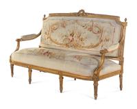A Louis XVI Style Carved Giltwood Five-Piece Parlor Suite