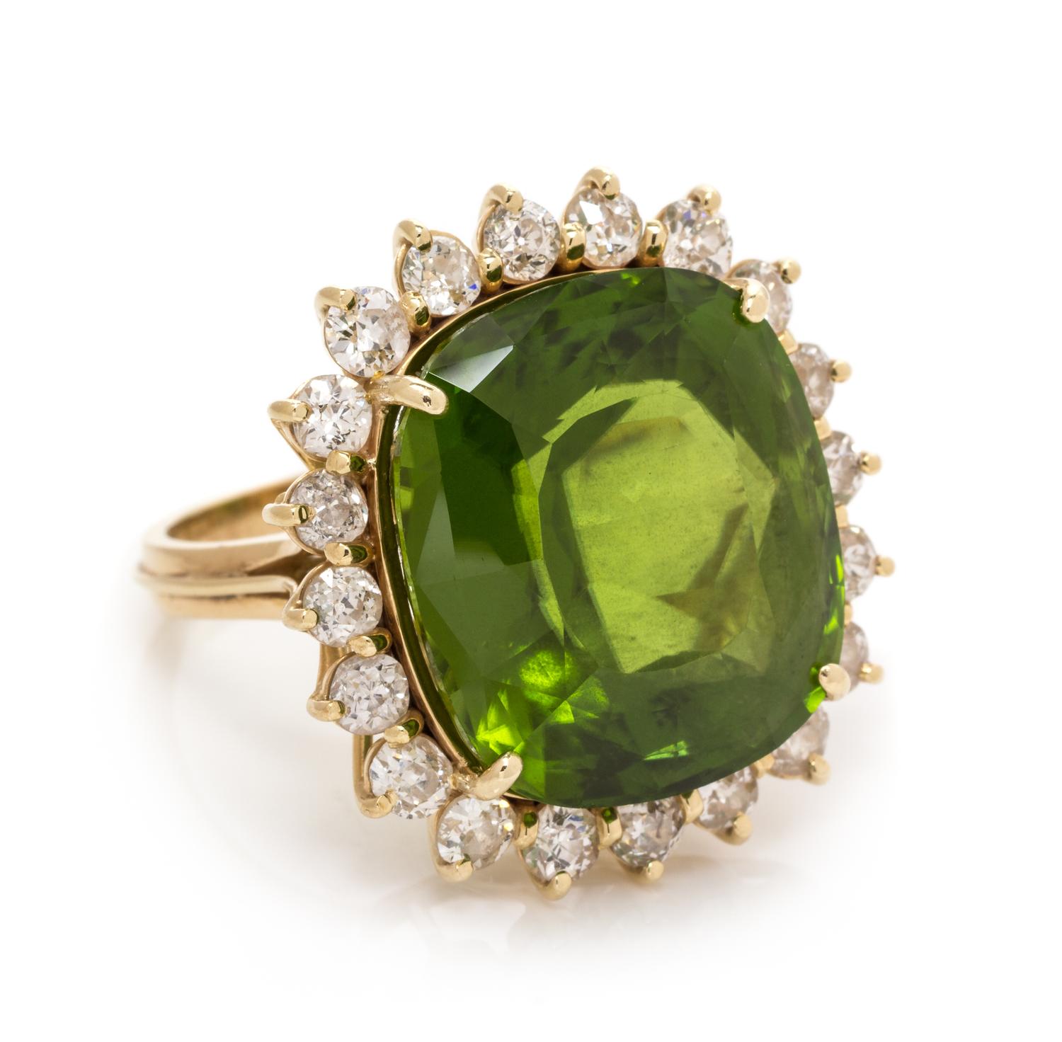 A 14 Karat Yellow Gold, Peridot and Diamond Ring, 11.95 dwts.