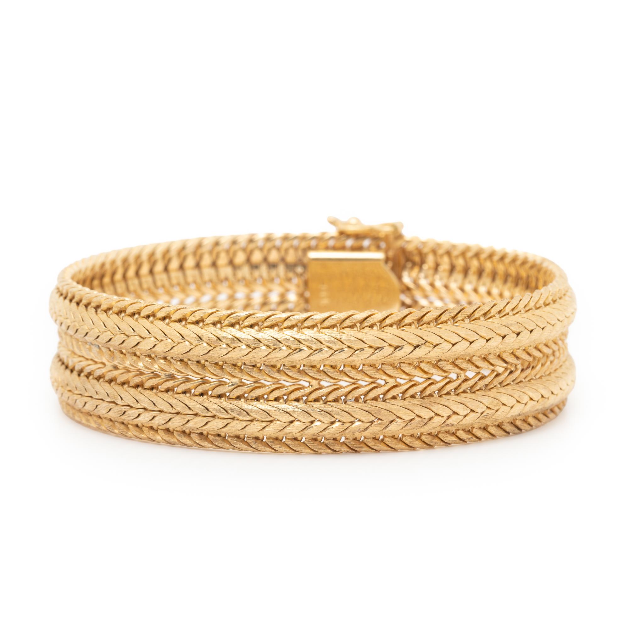 PLATINUM AND DIAMOND LINE BRACELET WITH A YELLOW GOLD JACKET