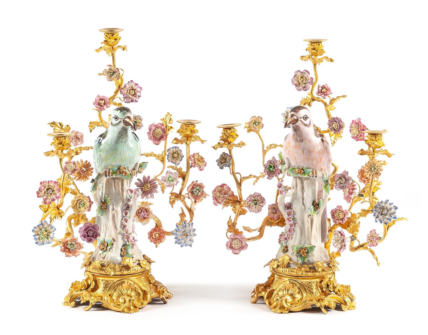 A Pair of French Gilt Bronze and Porcelain Three-Light Candelabra Height 22 inches.