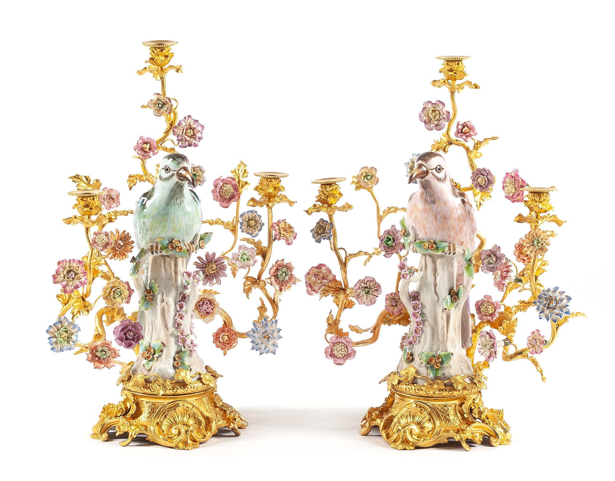 A Pair of French Gilt Bronze and Porcelain Three-Light Candelabra Height 22 inches.